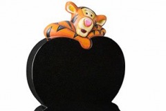 A fully carved 'tigger' leaning over a polished heart - shown in black granite.headstone 24" (h) x 18" (w) x 3" (d)Base 3" (h) x 24" (w) x 12" (d)Product code -  16156