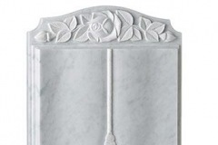 This book memorial is finished with a stunning flower carving - shown in carrara marble.headstone 30" (h) x 24" (w) x 3" (d)Base 3" (h) x 30" (w) x 12" (d)Product code -  16133