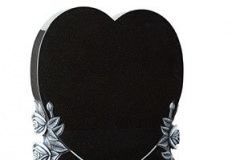 Natural hand carved roses emphasise the shape of this heart memorial - shown in dense black granite.Headstone 33" (h) x 24" (w) x 3" (d)Base 3" (h) x 30" (w) x 12" (d)Product code -  16107