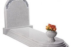 Rising steps to the headstone give grandeur to this memorial - shown in warwick grey granite.
Overall 3.0" (h) x 2.6" (w) x 6.6" (d)
Product code - EC109