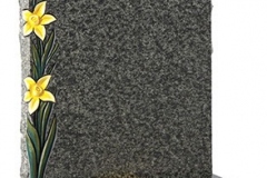 The carved and painted daffodils create a contrast to the rustic headstone and base - shown in jade green granite.Headstone 27" (h) x 21" (w) x 3" (d)Base 3" (h) x 24" (w) x 12" (d)Product code - 16060